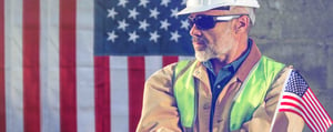 American_worker_in_hard_hat_with_flag